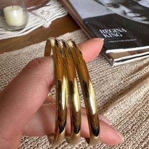 Set of 3 stainless steel bangles bracelets.